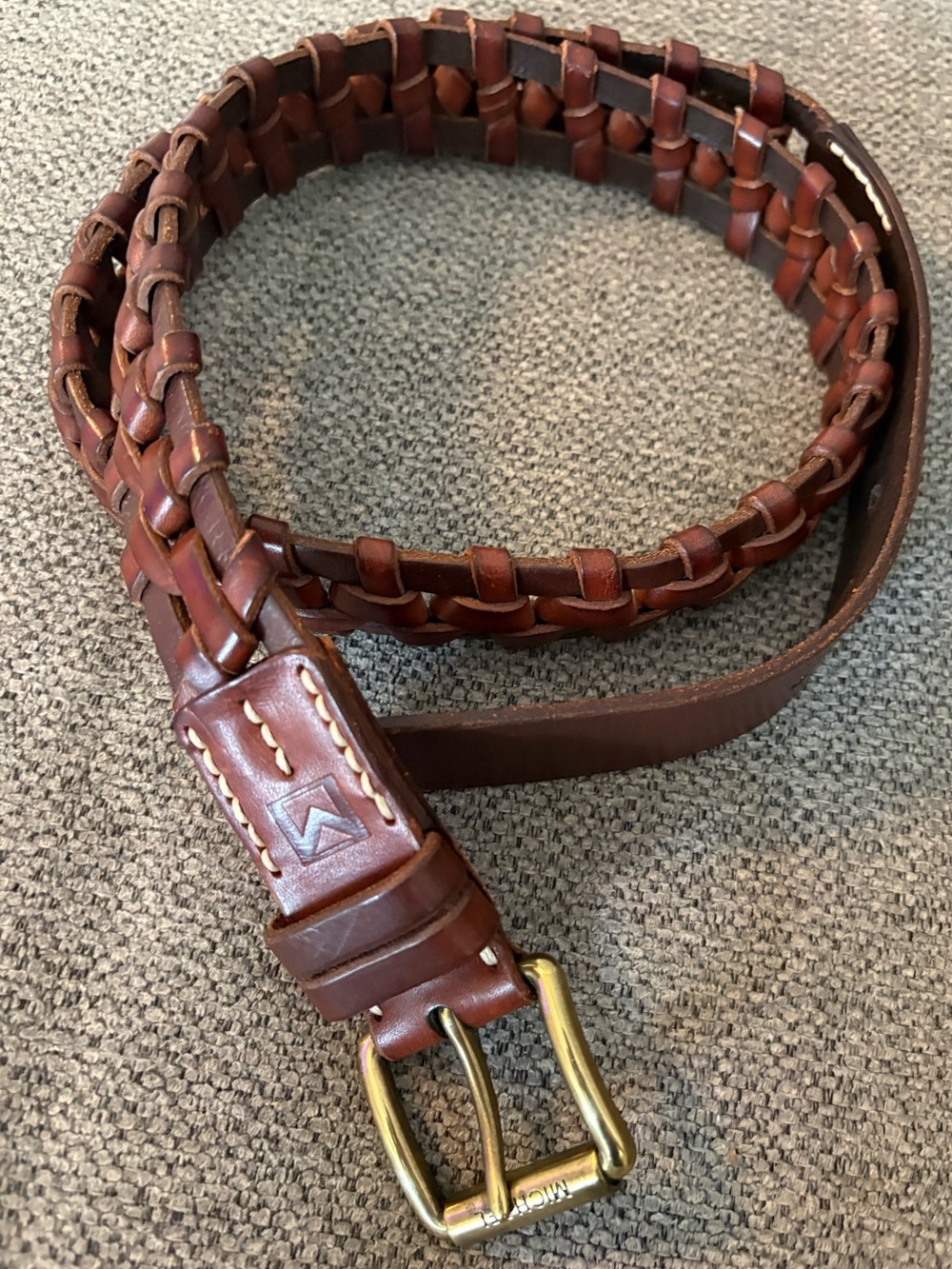 brown Italian leather belt by Michael Michael Kors with a brass buckle